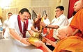 An alms giving for 500 Buddhist monks was held at Tangalle